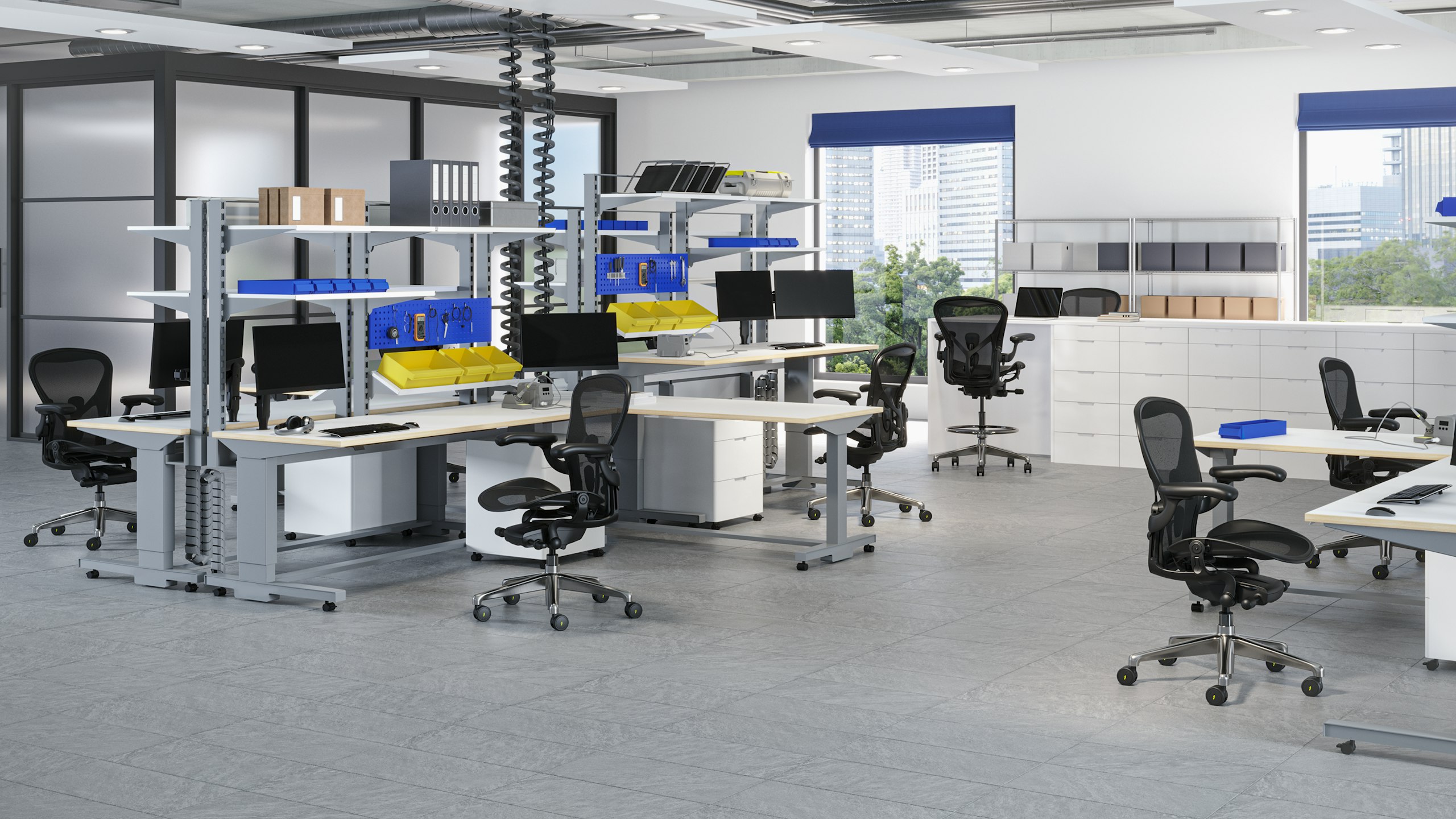 Aeron ESD Chairs and Stools in a traditional manufacturing space with dedicated workstations for electronics assembly.