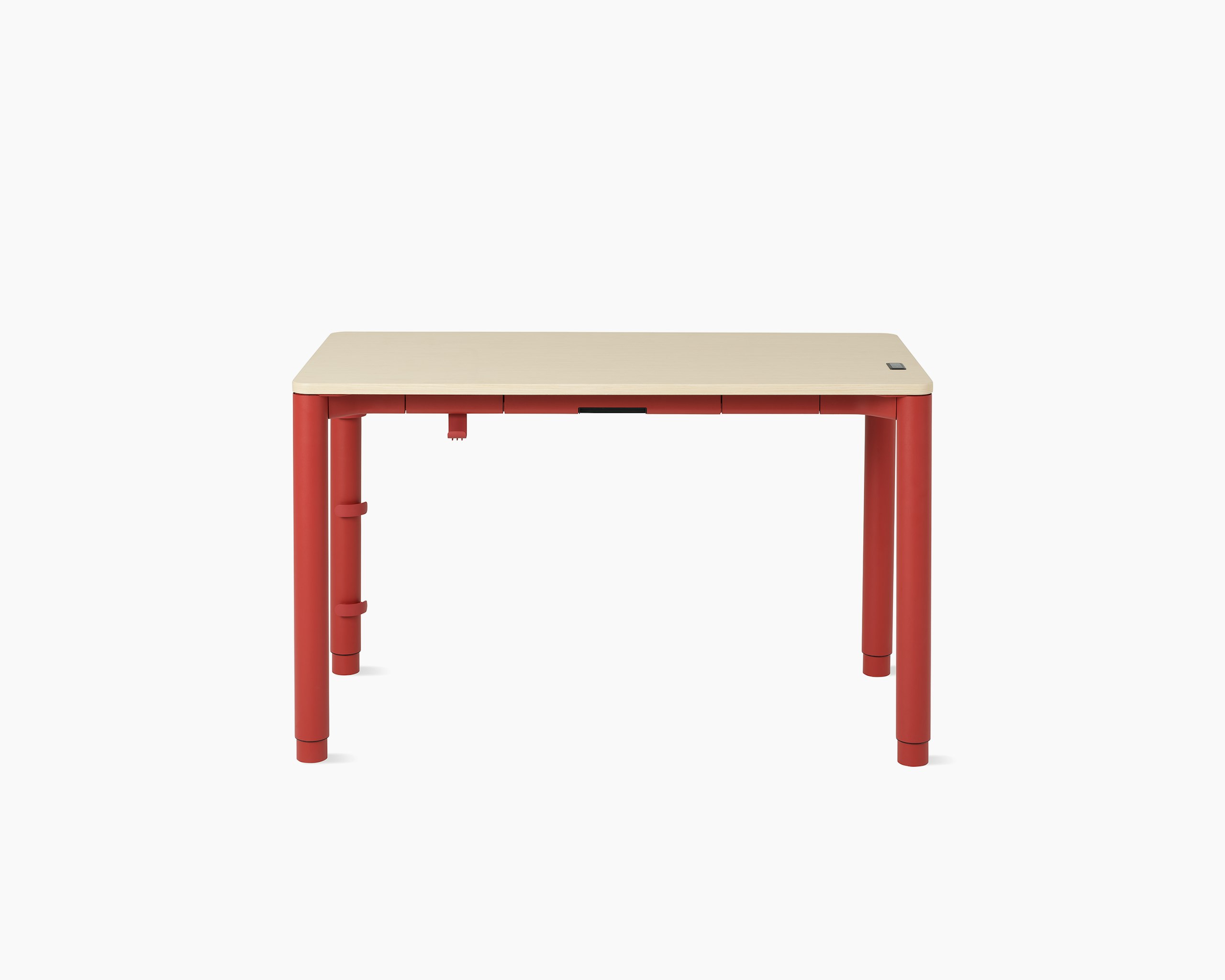 Front view of a four leg height-adjustable table shown with a light woodgrain surface and red legs.