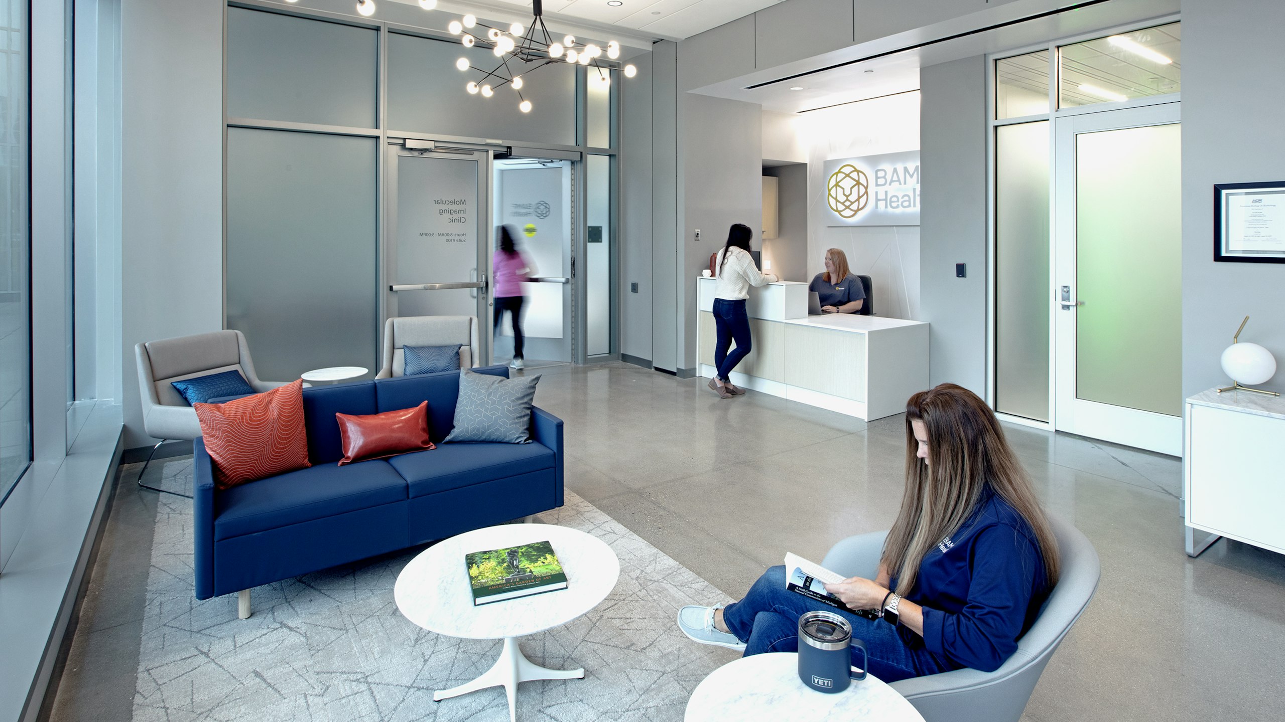 People in a reception area at BAMF Health